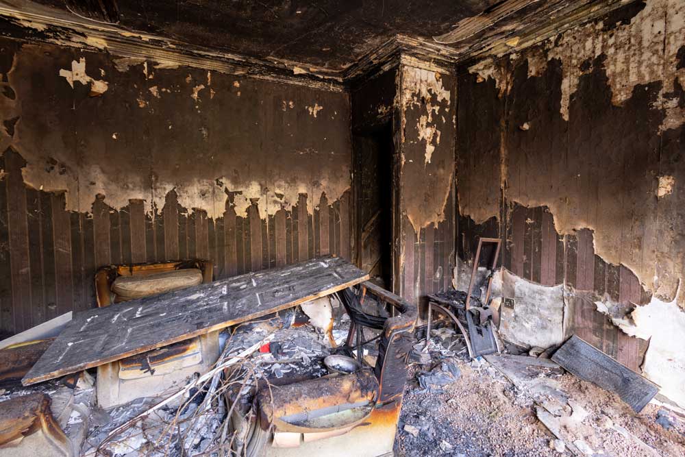 Major structural fire damage in a Tehama County property before restoration